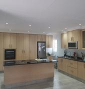 Maple melamine with Black granite worktops