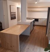 Modern white Kitchen with white quartz countertops