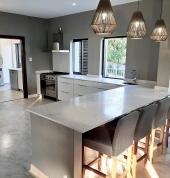 Duco White Kitchen with Quartz Countertops in Dunkirk Estate