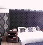 Custom Made Headboard with complimentary wallpaper installed