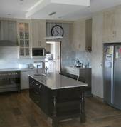 Hand painted Kitchen with Ceaserstone worktops