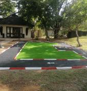 Rubber wetpour/flooring for bike track including artificial grass