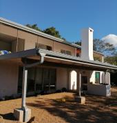 Seamless aluminium gutters installed.