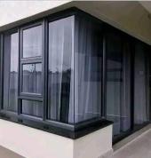 aluminum window installed with a sliding door