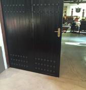 Decorative studs on internal folding stack doors