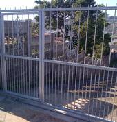 Mild steel galvanised with pedestrian gate inside