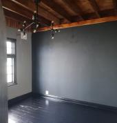 Ceiling board fitted and electrical lights installed and painted