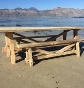 Reclaimed wood dining table and benches