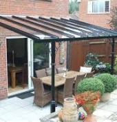 Pergola with clear polycarbonate roofing sheets.