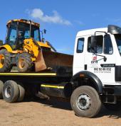 Machine and/or cargo transport via Rollback (Flatbed)