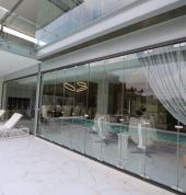 Frameless stacking door