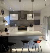 Ultra modern high-gloss white kicthen