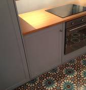 Kitchen with Moroccan Tiles and Bamboo Top