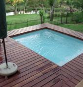 Deck splash pool with grass implants and decking waterkloof south africa