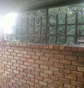 Wall plus steel fence