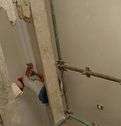 Guy busy fixing corniche