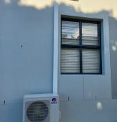 Outside unit of 12000 BTU inverter air conditioner with trunking  for neat finish