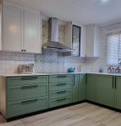 The green olive kitchen was done at the Ridge estate.it has organic hues and natural textures.