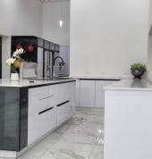 The client chose calacatta top because it is more durable and stronger which gives it a competitive edge over marble or granite tops.