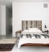 Agarsi Giovanni draws inspiration from international furniture trends and designs. The Amali headboard is a stunning addition to Di Lusso Home Collection. Its block panels create a geometric design visual which can both enhance and blend in with most bedr