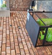 GAS GEYSER INSTALLED WITH CAGE AND CYLINDERS