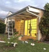 Completed patio roof design and roofing using polycab roof sheets.