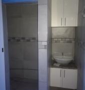 Wall tiling and varnity installation