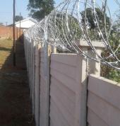 We precast and razor wire