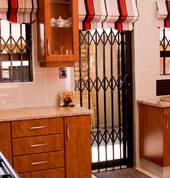 Window fixture with Retractable security door