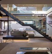 steel stairs with frameless glass balustrades