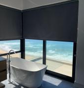 Roller Blinds in Blockout by Custom Blinds ®