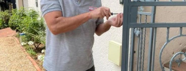 Rosebank Locksmiths - Parkwood - Locksmith Gregory Working on Security Gate Lock 1