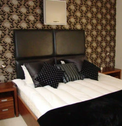 Flock wallpaper to add warmth to a spare room