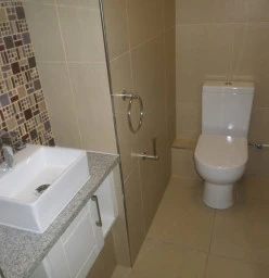 Plumbing done for toilet and basin.