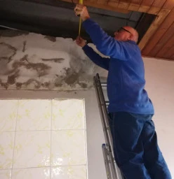 Old geyser removed, now repairing the hole in the pine ceiling