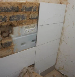 Gebrik toilet flushes installation and tiling at a Hospital