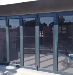 Aluminium Stacking/Folding and Palace sliding doors Midrand CBD Glass Installation