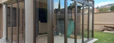 Aluminium Stacking/Folding and Palace sliding doors Midrand CBD Glass Installation