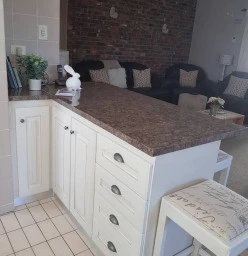 revamp of old kitchen with new doors and tops and paint effects