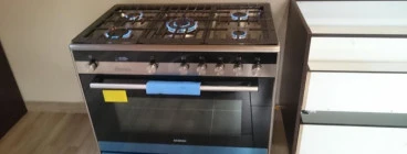 Gas stove with extended pipe run.