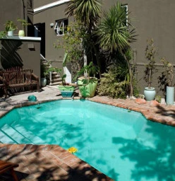 backpacker refurbishment of pool and waterproofing and painting of west wing
