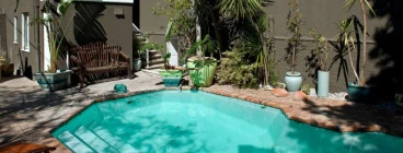 backpacker refurbishment of pool and waterproofing and painting of west wing