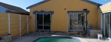 Removal of windows and Installation of sliding doors