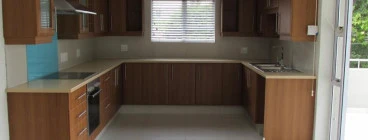 Wrap doors Bevel profile in Amati walnut with Caesarstone Quartz worktop