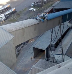 Stripping asbestors and installing wide span roof sheets
