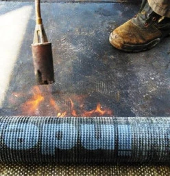 Torch on derbigum being applied.