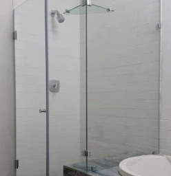 Hinged door with cut out over bath panels