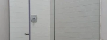 Hinged door with cut out over bath panels