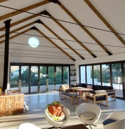 Beautiful new lounge with exposed rafters.