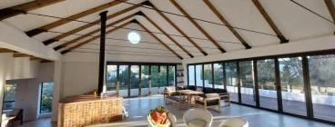 Beautiful new lounge with exposed rafters.